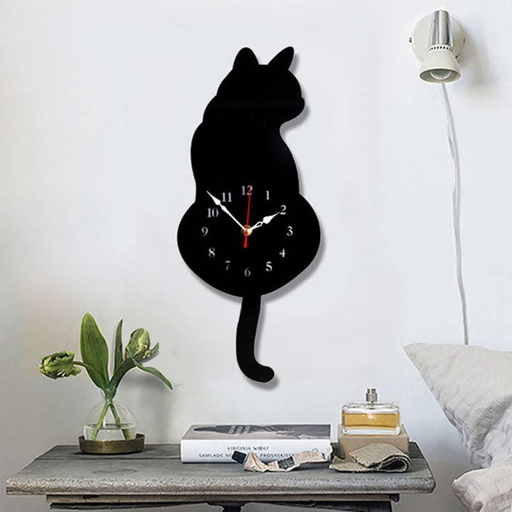 Ρολόι τοίχου με ουρά γάτας